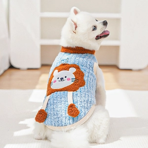 Detail of blue fleece pet vest with lion embroidery and stainless steel D-ring for leash
