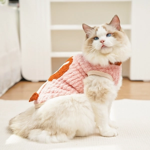 Close-up of soft coral fleece pet vest with a cute cartoon lion pocket detail