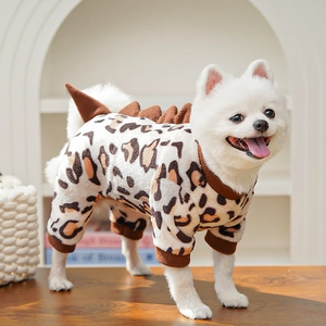 Detail of warm leopard print pet costume with 3D dinosaur fins and plush texture
