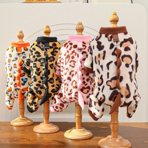 Close-up of leopard dinosaur pet jumpsuits with traction D-rings and coral fleece texture