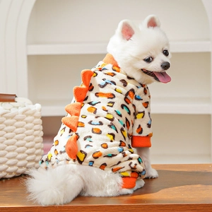 Detail of warm leopard print pet jumpsuit with orange dinosaur spikes on the back