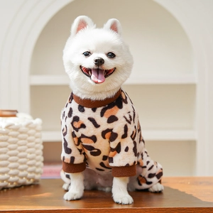 Close-up of leopard print pet jumpsuit featuring warm fleece fabric and ribbed cuffs