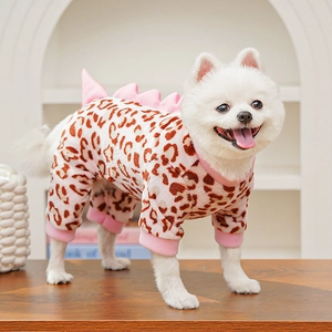 Detail of pink leopard print pet onesie with soft plush fabric and dinosaur fin decor