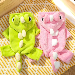 Fleece dinosaur pet pajamas in green and pink, cozy plush onesies for cats and dogs