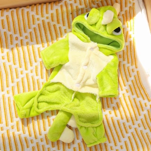Detail view of soft green dinosaur pet onesie with plush fabric and snap buttons