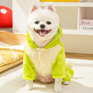 Close-up of soft green flannel dinosaur pet hoodie with buttons for dogs and cats