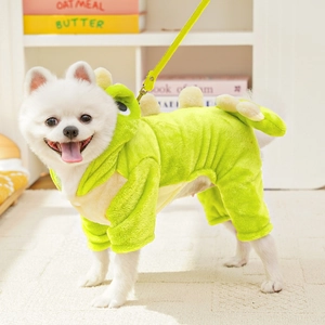 Close-up of green dinosaur pet hoodie with soft plush fabric and yellow back spikes