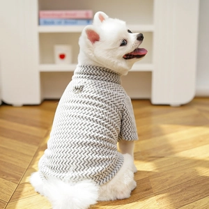 Detail of grey herringbone knit pet sweater with integrated D-ring for leash attachment