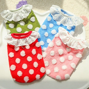 Detailed view of polka dot pet vests with lace collars and metal D-rings in four colors