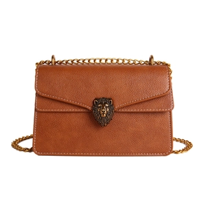 Brown lychee leather shoulder bag with vintage gold lion head buckle and chain strap