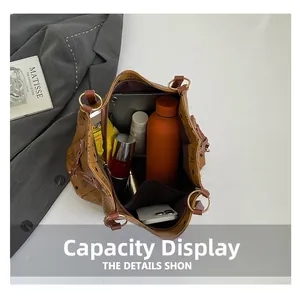 Top view of large capacity tote bag interior with vintage pattern and metal ring