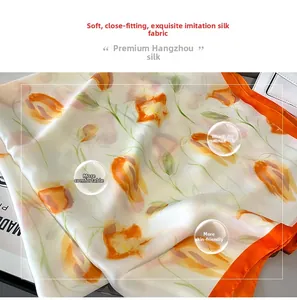Detailed texture of imitation silk scarf with orange tulips and stitched border