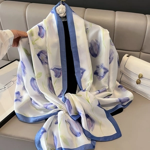 Elegant silk-like beach scarf with purple tulip floral print and royal blue borders