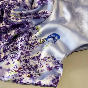 Elegant lavender silk-like scarf with floral prints and blue butterfly pattern