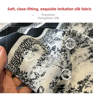 Macro detail of breathable silk-like fabric with black and white ink landscape patterns