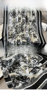 Detail of Toile de Jouy silk shawl with active carbon dyeing and precision edge stitching