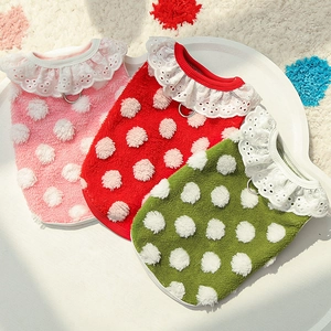 Detail of soft fleece pet vests with 3D polka dots, lace collar, and metal D-ring for leash