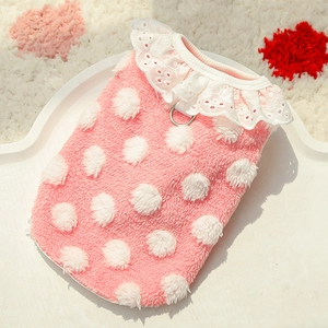 Detailed view of pink polka dot plush pet vest with white lace trim and metal D-ring attachment