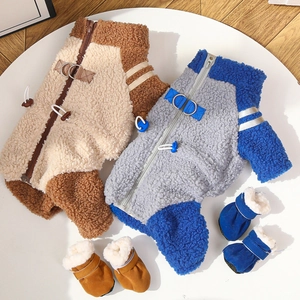 Detail of sherpa fleece pet winter jumpsuit with zipper and matching warm boots
