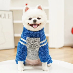 Detail of blue and grey fleece dog hoodie with reflective safety stripes on sleeves