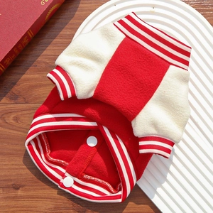 Close-up of red fleece dog baseball jacket with striped ribbed cuffs and snap buttons