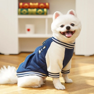 Detail of dog baseball jacket featuring polar fleece and cute bear embroidery patch
