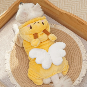 Detail of warm yellow bee-themed pet fleece jumpsuit with 3D wings on a white dog