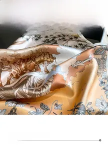 Close-up of fine edge stitching on vintage floral silk scarf with forest pattern