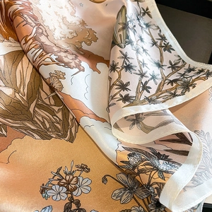 Silk square scarf with natural landscape print in cream and orange tones for women