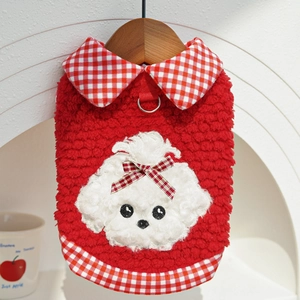 Detail of red fleece pet sweater with metal D-ring and checkered collar for leash attachment