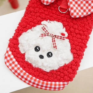 Detail of red fleece pet vest with poodle embroidery and metal leash D-ring