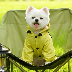 Close-up of waterproof yellow dog jacket with fleece lining and snap button closure