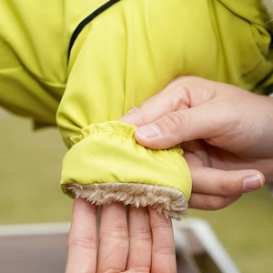 Detail of waterproof dog jacket cuff with thick fleece lining and elastic windproof design