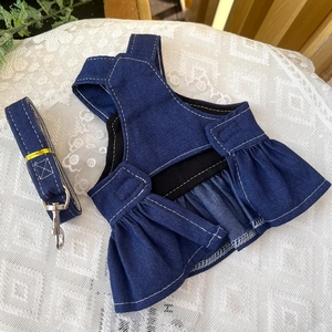 Detail of dark blue denim pet dress set with matching leash and ruffle hem skirt