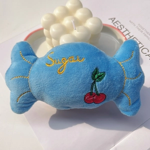Blue candy-shaped plush squeaky toy for dogs and cats featuring Sugar embroidery