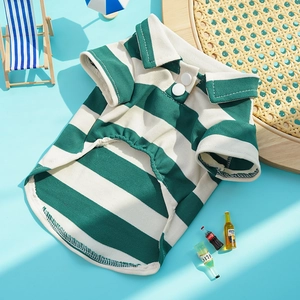 Close-up of a green and white striped pet polo shirt with breathable mesh fabric