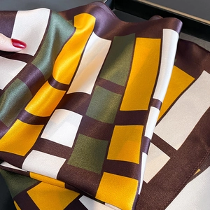 Elegant geometric color-block silk neck scarf for women featuring premium satin texture