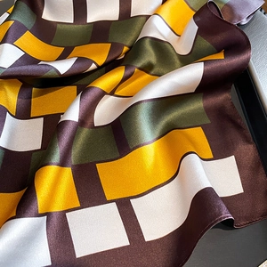 Luxurious geometric color-block silk square scarf with elegant mustard and green patterns