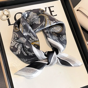 Elegant silk scarf with black and white Paisley pattern and yellow geometric lines