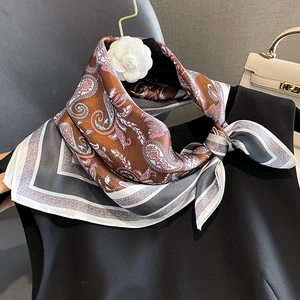 Elegant paisley silk square scarf with earthy tones and floral patterns for women