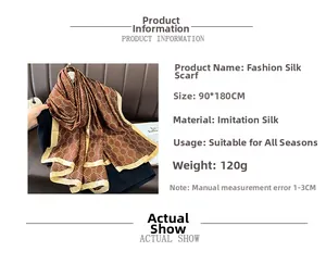 Detail view showing brown silk scarf with gold chain print and 90x180cm size specs