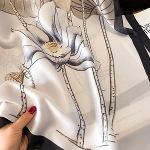 Silk shawl with lotus flower ink painting pattern and black border trim in pearl white