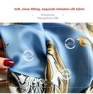 Detail of soft silk-like fabric with golden baroque floral patterns and smooth texture