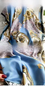 Detail of vintage floral silk scarf showing precise edge stitching and baroque pattern