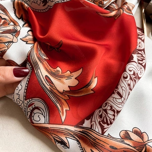 Elegant red and beige baroque floral silk scarf with golden pattern and glossy texture