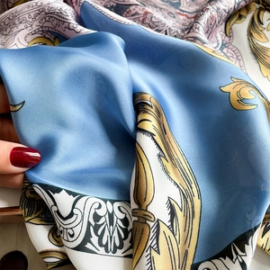 Baroque floral print long silk scarf for women featuring gold paisley patterns