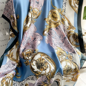 Elegant vintage floral silk scarf with baroque gold scrolls and paisley patterns