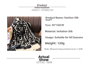 Detail of a 90x180cm faux silk scarf featuring black and white geometric pattern design