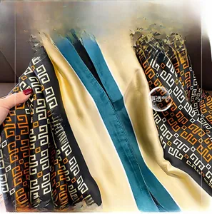 Detailed view of lightweight geometric pattern scarf with premium silk-like texture