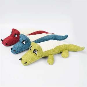 Three-color plush crocodile squeaky dog chew toys in red, blue, and green colors